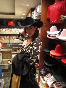 trying on cowboy hats